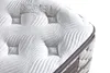 Close-up view of a white mattress with a quilted pattern and a gray border. Produktbild-Vorschau