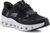 A black Skechers sneaker with a white sole. Voir les images du produit