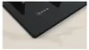 A close-up view of the corner of a black gas hob with the Neff logo visible. Anteprima dell’immagine prodotto