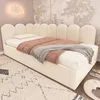 A bedroom scene with a daybed, bedding, rug, and wall decor. Náhľad obrázku produktu