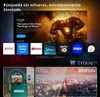 A television screen displaying various streaming service apps and a movie poster, with smaller inset images showing a smartphone interacting with a TV and a cityscape at night. Náhled obrázku produktu