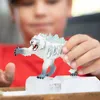 A child is holding a toy tiger figure over ice blocks. Produktbild-Vorschau