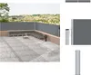 A patio with a sectional sofa and a grey retractable side awning. Produktbild-Vorschau