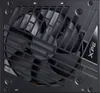 A close-up view of the fan and grille of a computer power supply unit. Produktbild-Vorschau