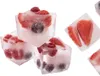 Several ice cubes containing strawberries, blueberries, and raspberries are arranged on a white background. Podgląd zdjęcia produktu