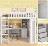 A loft bed with a desk and wardrobe underneath, presented in a room setting with decorative elements. Náhled obrázku produktu