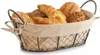 A bread basket filled with various types of bread and pastries, placed on a white background. Anteprima dell’immagine prodotto