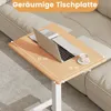 A laptop table is placed next to a sofa, with a laptop and a cup of coffee on it. Produktbild-Vorschau