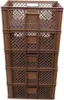 A stack of four brown plastic crates. Produktbild-Vorschau