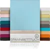 A stack of fitted sheets in various colors, with a light blue sheet prominently displayed in the center. Produktbild-Vorschau
