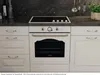 A Gorenje oven and stovetop are shown in a kitchen setting. Produktbild-Vorschau
