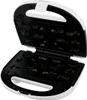 An open waffle maker with patterned plates. Produktbild-Vorschau