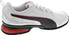 A side view of a white Puma athletic shoe with black and red accents. Produktbild-Vorschau