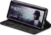 A smartphone in a black flip case is displayed, showing a movie poster on its screen. Produktbild-Vorschau