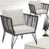 Two outdoor lounge chairs with cream cushions and black rope-like detailing on a light gray and white background with water droplet graphics. Produktbild-Vorschau