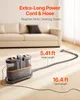 A carpet cleaning machine is shown on a carpeted floor with a couch in the background. Text overlays highlight the cord and hose length. Anteprima dell’immagine prodotto