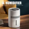 A white humidifier and air purifier sits on a wooden table, with a blurred yellow couch in the background. Náhled obrázku produktu