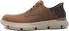 A side view of a brown Skechers slip-in sneaker against a white background. Voir les images du produit