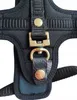 Close-up of a black dog harness with brass hardware. Produktbild-Vorschau