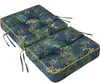 A close-up, studio shot of a tufted cushion with a tropical leaf pattern. Podgląd zdjęcia produktu