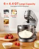 A kitchen mixer with a bowl of whipped cream, strawberries, and a cake slice on a wooden table. Produktbild-Vorschau