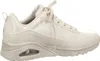 A side view of a beige Skechers sneaker. Voir les images du produit