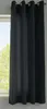 A black curtain hanging in front of a window. Produktbild-Vorschau