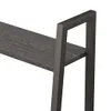 A close-up view of a shelf and metal frame of a shelving unit. Podgląd zdjęcia produktu