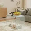 A glass coffee table with apples and books on it, in a living room setting. Anteprima dell’immagine prodotto