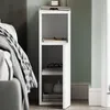 A white bedside table with one door is placed next to a bed. Produktbild-Vorschau