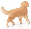 A figurine of a golden retriever dog. Anteprima dell’immagine prodotto