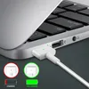 A close-up of a MacBook Air charging port with a MagSafe 2 charger plugged in, accompanied by graphics illustrating charging status. Produktbild-Vorschau