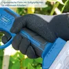 A gloved hand holding the handle of a blue and black power tool, possibly an electric pruning shear, with green foliage in the background. Anteprima dell’immagine prodotto
