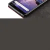 A close-up shot of a red and black phone case with a phone inside. Náhled obrázku produktu