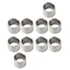 A collection of metal washers or spacers arranged on a white background. Podgląd zdjęcia produktu