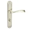 A silver-colored door handle set with a lock mechanism, isolated on a white background. Produktbild-Vorschau