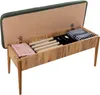 An open storage bench with items inside. Voir les images du produit