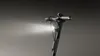 Close-up of the handlebars and front light of an electric scooter. Produktbild-Vorschau