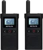 Two black Retevis walkie-talkies are shown side-by-side against a white background. The screens display channel information and icons. Náhled obrázku produktu
