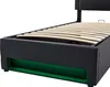 Close-up view of the base of a bed frame, showing the slatted mattress support and the storage compartment underneath. Náhľad obrázku produktu
