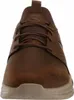 A front view of a brown Skechers shoe. Voir les images du produit