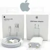 Product packaging for an Apple Lightning to USB cable and a USB power adapter. Náhled obrázku produktu