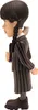 A side view of a Wednesday Addams figurine. Podgląd zdjęcia produktu