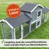 A wooden animal hutch with multiple compartments and runs, set up on a grassy lawn. Produktbild-Vorschau