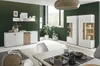 A modern dining room with a sideboard and display cabinets. Produktbild-Vorschau