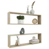 Two wooden cube shelves are displayed against a white background, each decorated with various items. Produktbild-Vorschau