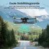 A drone is shown hovering over a road in a forest, with a map overlay and feature callouts. Produktbild-Vorschau