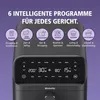 A close-up of the control panel and top section of a black air fryer, with marketing text and icons above it. Produktbild-Vorschau