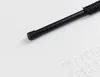 A black curtain rod with clear plastic curtain hooks on a white background. Produktbild-Vorschau