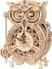 A wooden 3D mechanical owl clock. Produktbild-Vorschau